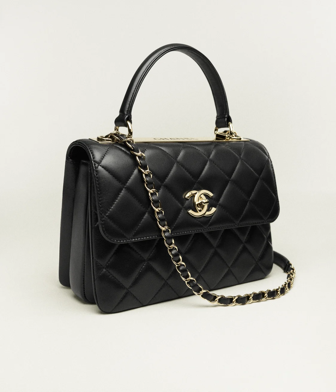 FLAP BAG WITH TOP HANDLE
